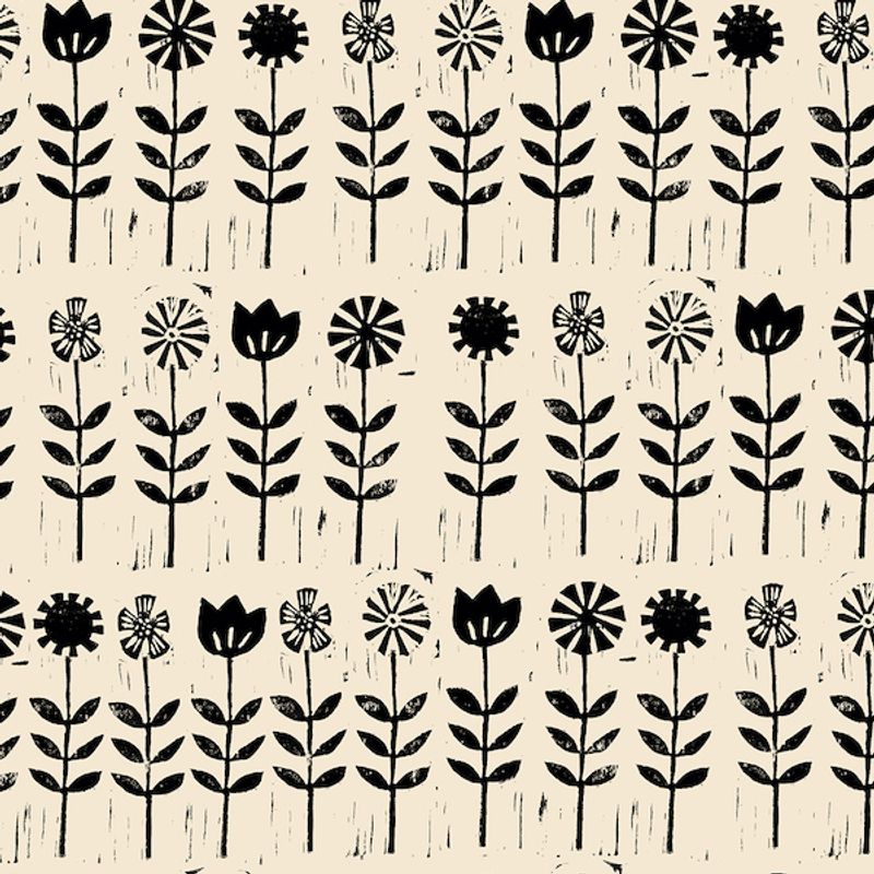 Naturhvit med svarte blomster
