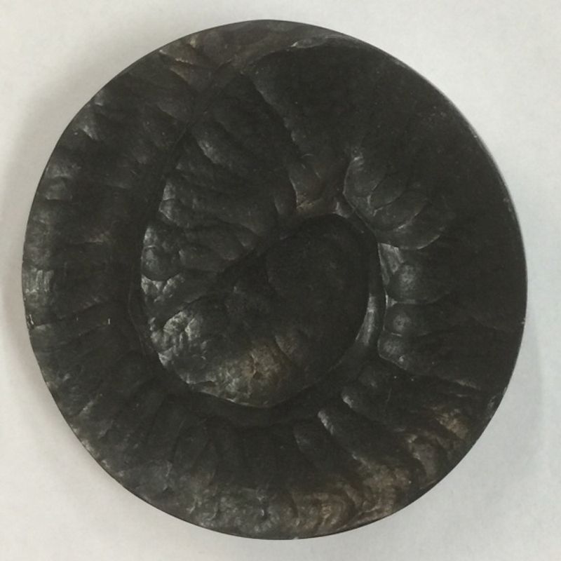 Spiralformet knapp